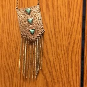 Long silver necklace with triangle detail